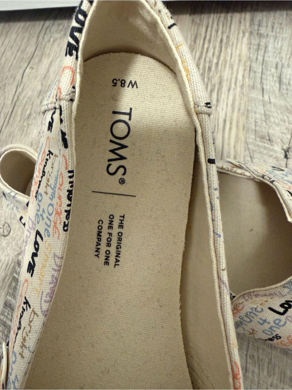 Toms Women's Cream Canvas Slip-On Flats with Multicolor Script - Picture 3 of 3